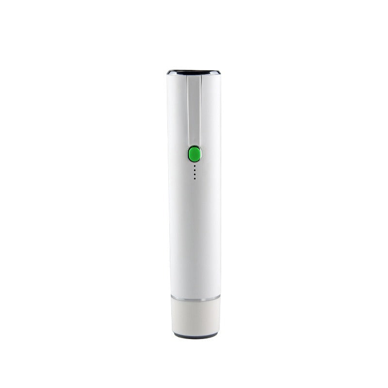 Pen-shaped food sealer next to coffee beans to show airtight storage use