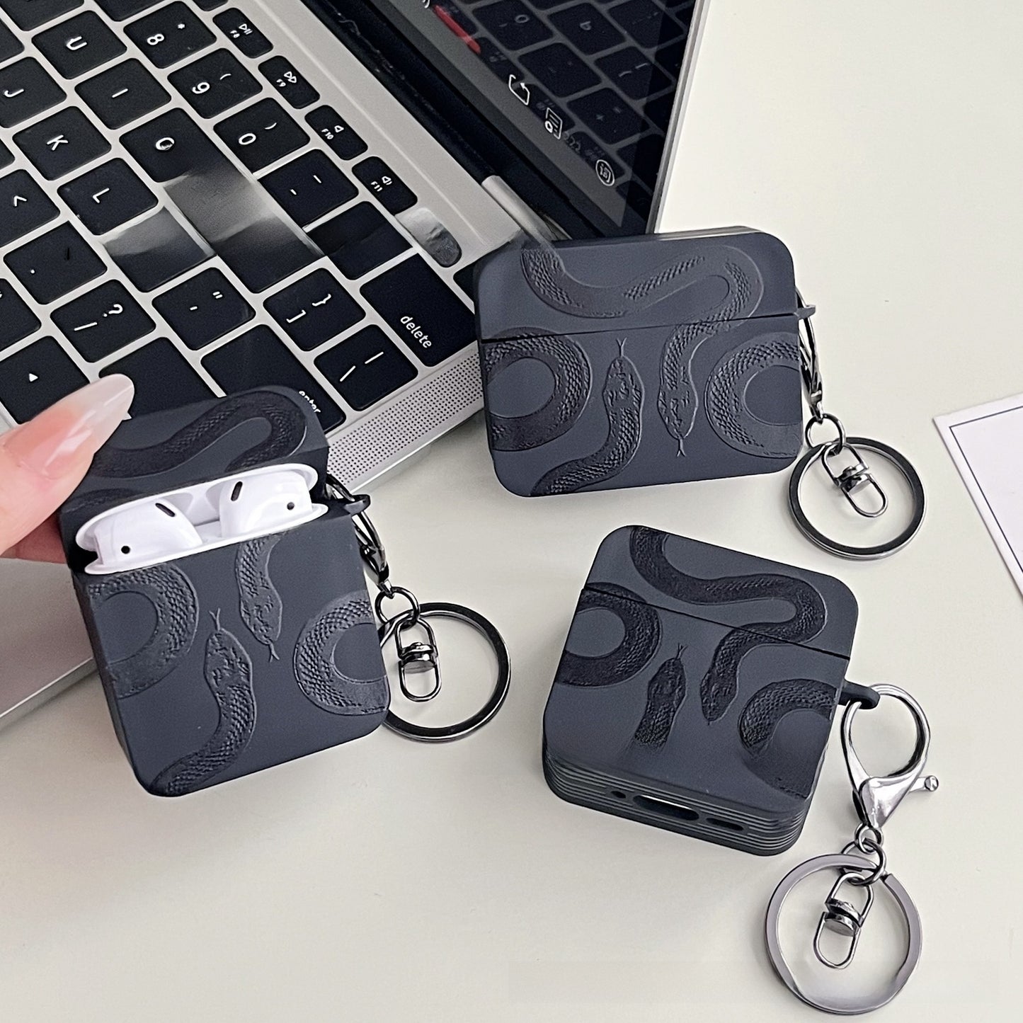 Double snake case fitted to AirPods Pro charging case