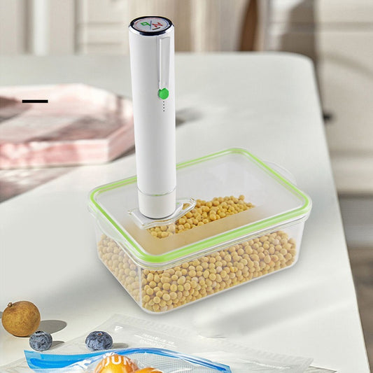 H9 food sealer in black with green button, sized to fit a kitchen drawer